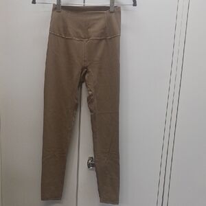 Set Of FREE MOVEMENT Tan High-Waisted Leggings and Sports Bra